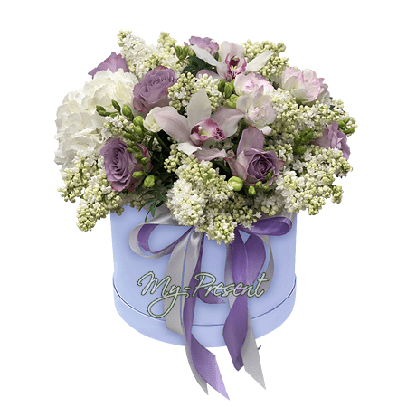 Lilas, roses, orchidees et hortensias dans une boîte